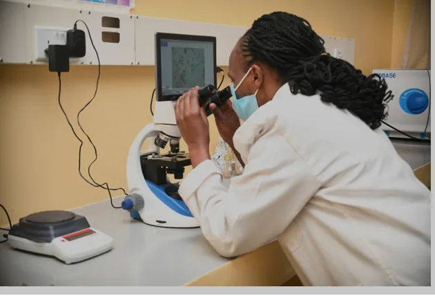Microscope in the NPRC microbiology laboratory
