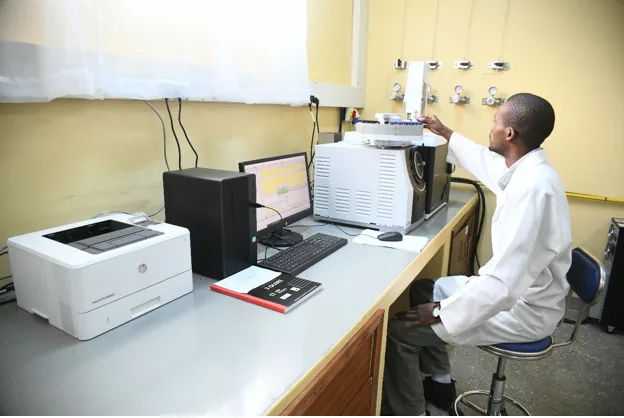 NPRC staff working on the Gas Chromatography Mass Spectrometer (GC-MS)